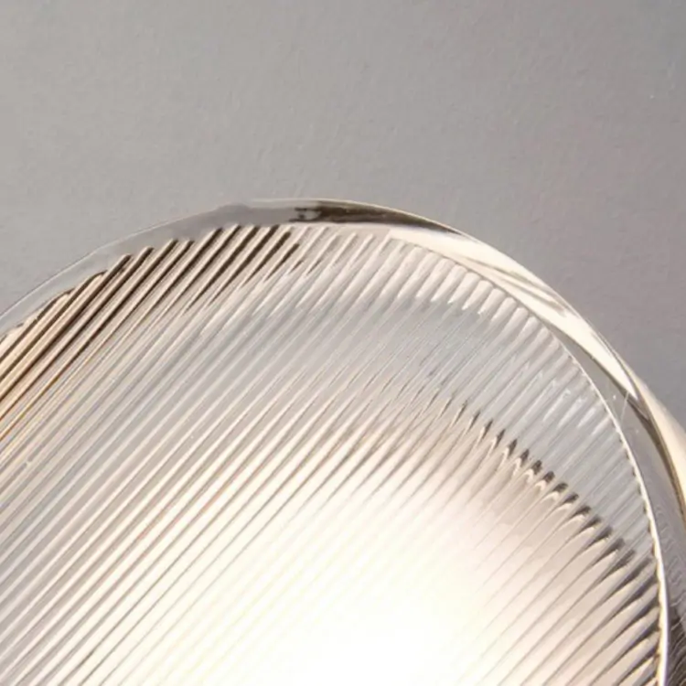 Reflektor osłonięty przezroczystą tubą szklaną